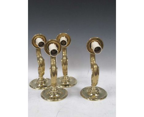 A set of 4 modern polished brass wall light brackets, fitted for electricity, 30cm long