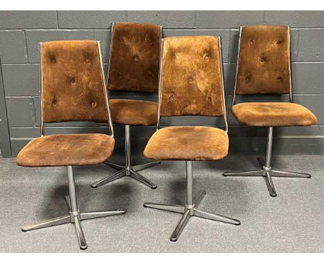 A set of four late 20th century button back and tubular chrome swivel action dining chairs by Keron London circa 1970 (4)