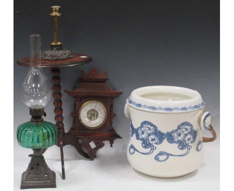 A miniature mahogany tripod table, 39cm high, a slop pail, a small oil lamp, a small aneroid barometer and a candlestick