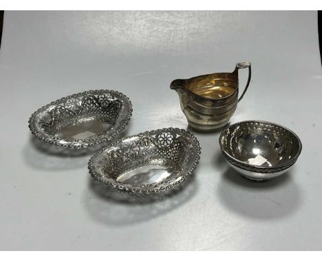 A collection of silver including a George III cream jug, mark of Peter &amp; Ann Bateman, an Arts &amp; Crafts sugar bowl, ma