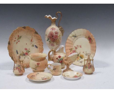 A collection of Royal Worcester blush ivory porcelain painted with flowers, to include a pair of miniature two-handled vases,