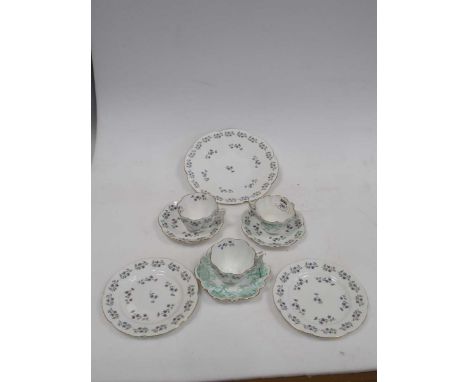 Two Wileman Shelley medallion trios in the Violet pattern, no.8309, and a single corresponding plate; together with a Foley C