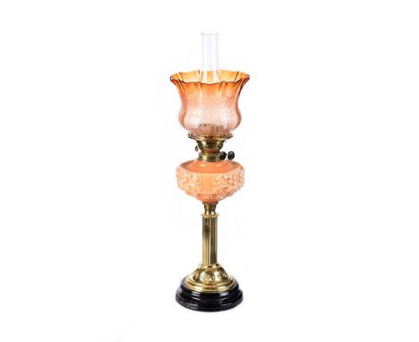 VICTORIAN BRASS PILLAR OIL LAMP WITH EMBOSSED GLASS BOWL & ETCHED GLASS SHADE. RAISED ON A CIRCULAR BASE. HEIGHT: 23 INCHES. 