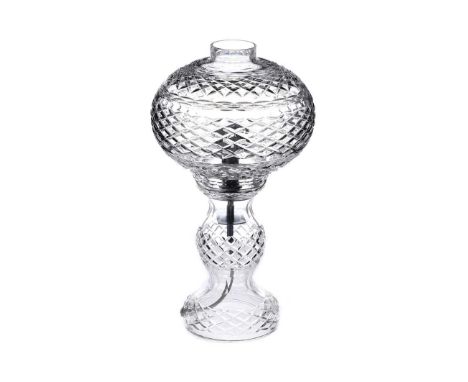 WATERFORD CRYSTAL TABLE LAMP WITH GLOBE SHADE. RAISED ON A CIRCULAR FOOT BASE. HEIGHT: 16 INCHES. IN GOOD CONDITION.