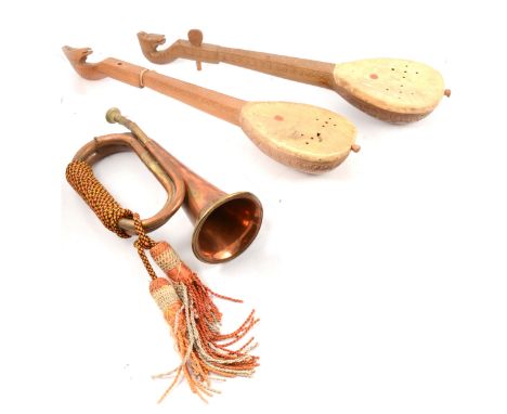 Two ethnic stringed instruments; and a post horn and bugle.