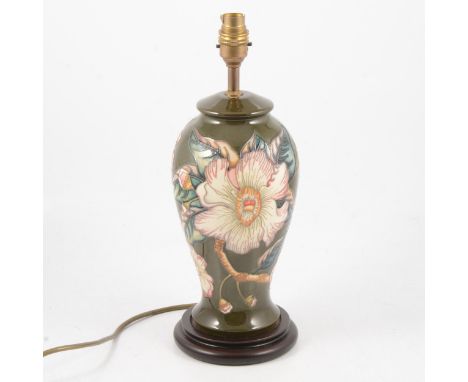 Moorcroft Hibiscus pattern table lamp, green ground, circular base, 38cm to fitment.