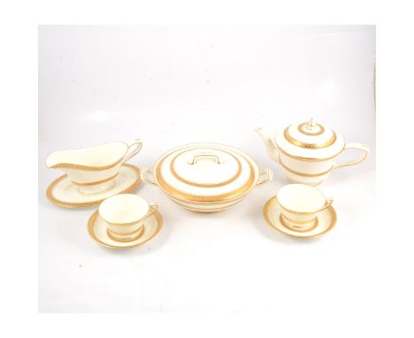 A Royal Worcester bone china dinner and tea service, Coronet pattern, six place table setting, together with tureens, saucebo