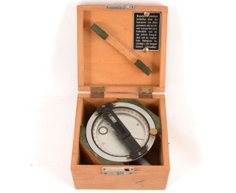 A Gebruder Wichmann surveyor's compass, in wooden case, 10cm x 16cm.