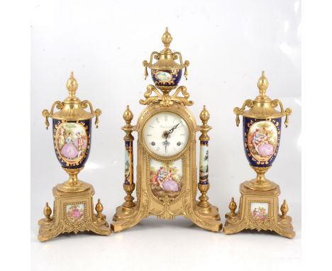 Reproduction French mantle clock garniture, brass case with porcelain mounts, comprising clock with Franz Hermle movement str