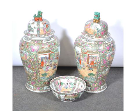 Pair of large Chinese polychrome temple vases, domed covers with kylin finial, painted with reserves of figures, six characte