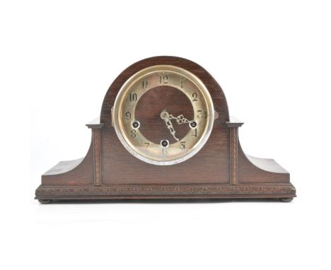 Oak mantle clock, domed case, circular dial, Enfield movement striking on four gongs, width 42cm.