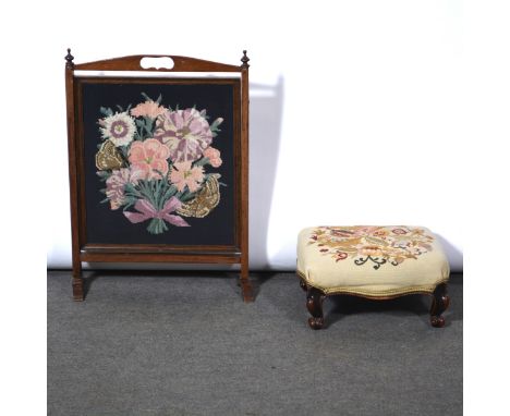 Victorian footstool, scrolled mahogany legs, 40x36cm, and an oak framed firescreen with a woolwork panel, 74x52cm.