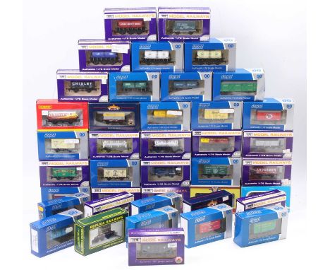40 various boxed 00 gauge items of rolling stock by Dapol, Hornby, Bachmann, and others, examples to include a Dapol limited 