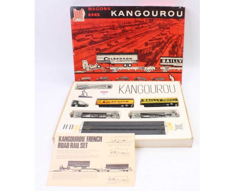 A Jouef H0 scale Kangouru French Road Rail gift set No. P664 comprising of tractor unit, access ramp, loading area, two Kango