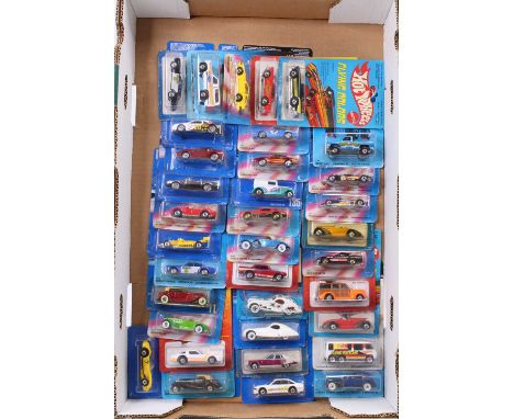 One tray containing a collection of mainly 1980s and 1990s carded Hotwheels Mattel diecast vehicles to include a Hot Ones 195