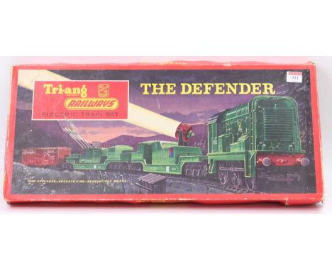 Triang RS50 'The Defender' military trainset comprising searchlight wagon; 4-rocket launcher complete with rockets; exploding