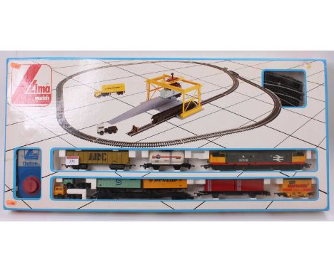 A Lima No. 107157 Industrial and Commercial diesel railfreight boxed trainset, comprising of diesel No. 37519 locomotive with