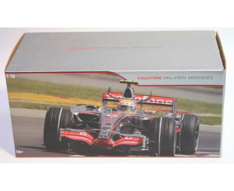 Hotwheels 1/18th scale of Formula 1 Mercedes MP4-22 Lewis Hamilton 1st Winner Racing Car, housed in the original pictorial pa