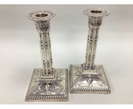 Mappin Brothers; A Pair of Victorian Highly Decorative Hallmarked Silver Candlesticks, Sheffield 1890, each of pillar design 