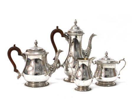 Asprey; A Hallmarked Silver Four Piece Teaset, London 1975, comprising coffee pot, teapot, lidded twin handled sugar bowl and