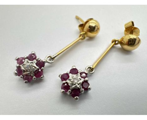 A Pair of Diamond and Stone Set Drop Earrings, of floral cluster design, the illusion set diamond within claw set surround, s