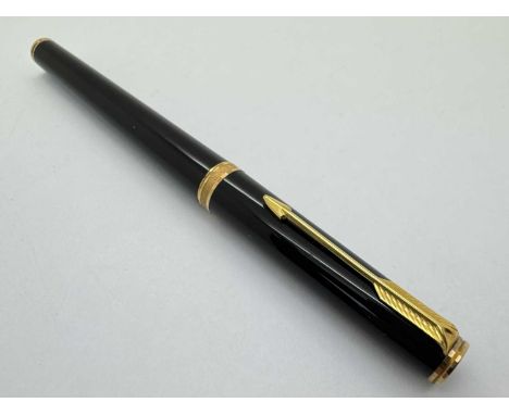 Parker; A Fountain Pen, with 18k 750 nib, 13.6cm long.