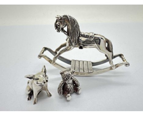 Lexi Dick; A Modern Hallmarked Silver Miniature Rocking Horse, (hallmarked rubbed), 6cm wide; Together with A Lexi Dick Moder