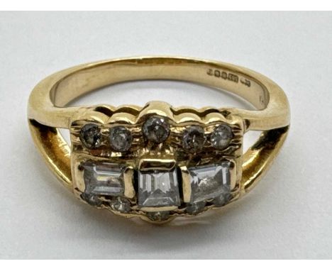 A Modern 14ct Gold Decorative Diamond Cocktail Ring, in the Art Deco style, the varied cut stones allover collet set between 