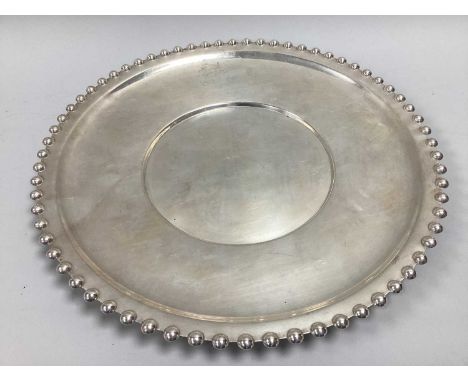 Wallace Sterling; An American Circular Serving Tray, of plain design with beaded surround, stamped "WALLAGE STERLING" undersi