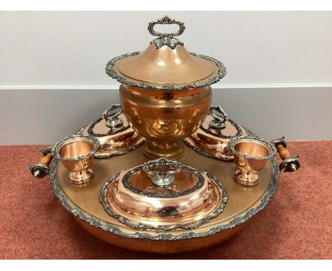 Goldfeder; A Plated on Copper Lazy Susan Bain Marie, fitted with removable central lidded soup tureen, three oval lidded entr