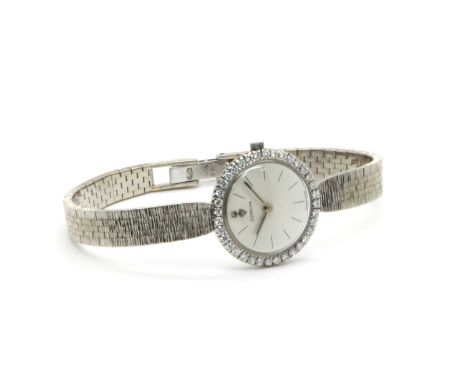 Corum; A Diamond Inset Cocktail Wristwatch, the signed dial with baton markers, within circular case with inset highlight sur