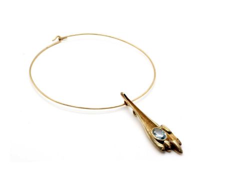 A Large 9ct Gold 1970's Modernist Style Single Stone Pendant, KMH, London 1973, the oval stone collet set within textured Mod