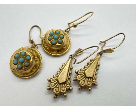A Pair of 9ct Gold Antique Etruscan Revival Style Drop Earrings, with inset highlights to centre in the form of a flowerhead,