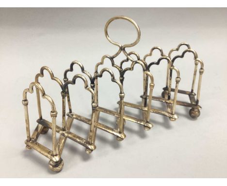 William Hutton &amp; Sons Unusual Plated Expanding Seven Bar Toast Rack, on ball feet, extended length approximately 27cm
