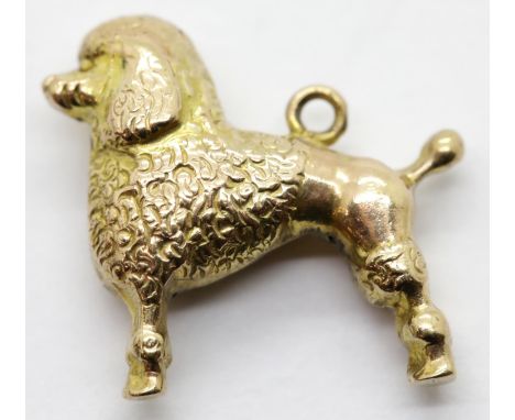 9ct yellow gold 1970s toy poodle dog charm, L: 2.5 cm, 1.2g. P&amp;P Group 1 (£14+VAT for the first lot and £1+VAT for subseq