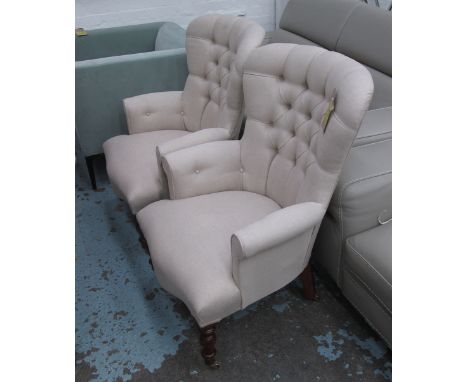 ARMCHAIRS, a pair, button back in neutral fabric on turned castor supports, 68cm W. (2)