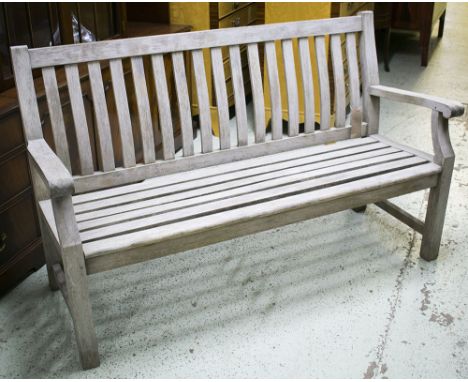 GARDEN BENCH, weathered teak of slatted construction, 152cm W.