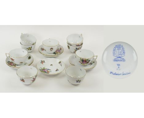 HEREND TEAWARES, comprising nine teacups and seven saucers all decorated fruits and flowers. (16)