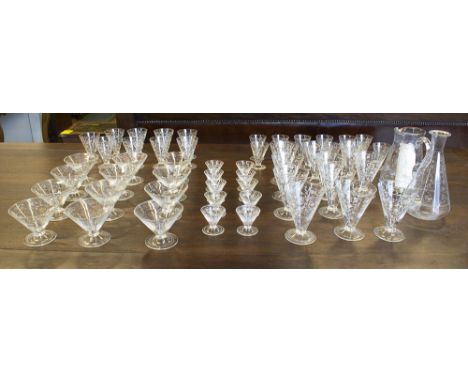 GLASSES, Art Deco set of decanter, jug and matching drinking glasses all trailing floral decorated. (57)