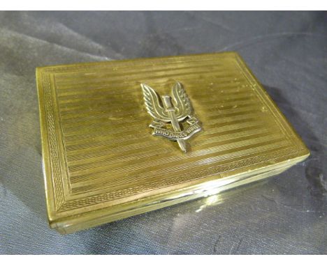 Brass Snuff/Cigarette case with mounted hat pin 'Who Dares Win' (SAS) with engine turned decoration to top