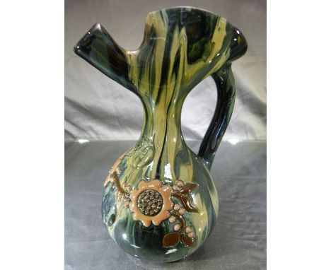 Elton Ware (Sunflower Pottery) Ewer having a stylised spout in a cream and green ground glossy glaze.The Globular body is dec