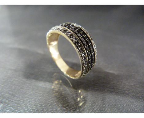 9ct Gold 8.5 mm wide band ring with 2 bands of illusion set small white diamonds, with a central double row of 38 small 'Blac