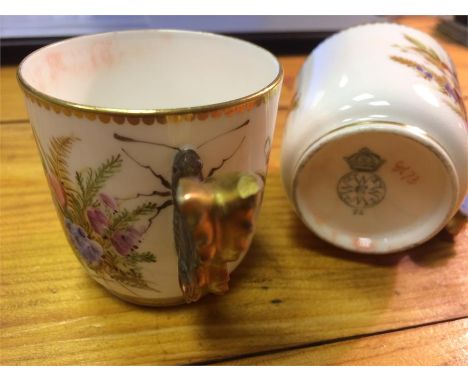 Two Royal Worcester porcelain teacups with butterfly handles with flora & fauna decoration (small chip to one butterfly wing)