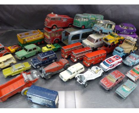 Selection of various Die-Cast toy cars - E.R.F Fire Tender Dinky, Dinky Pullmore Car Transporter, Dinky Ford Transit Van, Din