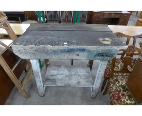 A pine work bench and a set of stepladders