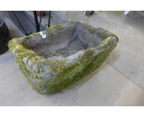 A stone garden trough