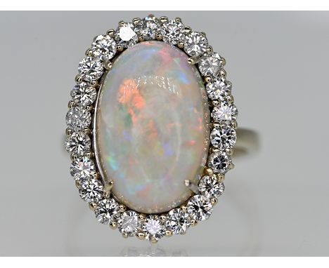 Cocktail-Ring mit Opal-Cabochon 5,63 ct und 22 Brillanten, zus. ca. 1,4 ct, Juwelierarbeit, 80-er Jahre585/- Weißgold; Gesamt