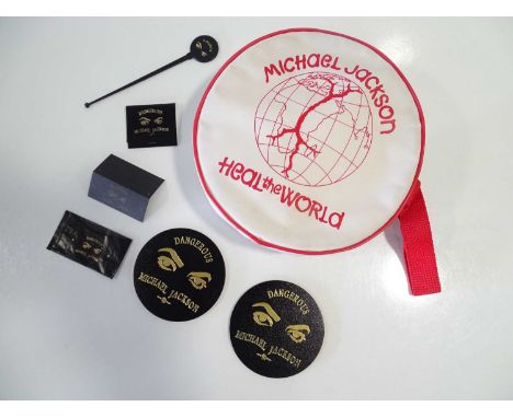 A pair of MICHAEL JACKSON promotional items comprising 'Heal The World' (1992) UK only first aid kit - new complete with cont
