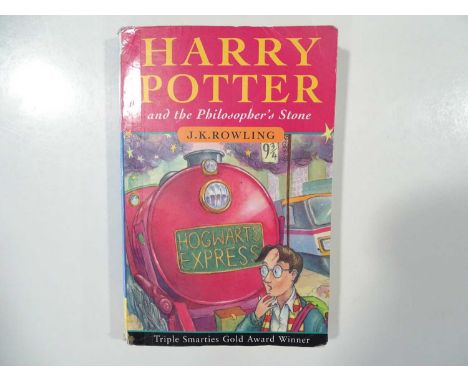 HARRY POTTER - a run of four paperback books from the HARRY POTTER series to include THE PHILOSOPHER'S STONE (1997), THE CHAM