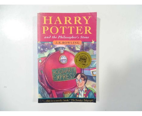 HARRY POTTER - a run of four paperback books from the HARRY POTTER series to include THE PHILOSOPHER'S STONE (1997), THE CHAM